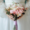 Romantic Whisper wedding bouquet with peonys, roses, lisianthus, and waxflower in Edmonton