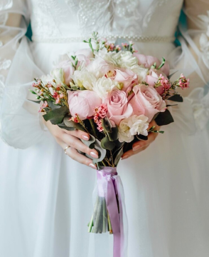 Romantic Whisper wedding bouquet with peonys, roses, lisianthus, and waxflower in Edmonton